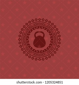 kettlebell icon inside red icon or emblem