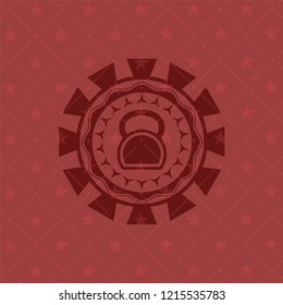 kettlebell icon inside red emblem