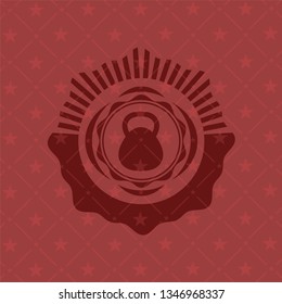 kettlebell icon inside red icon or emblem