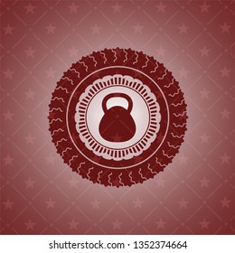 kettlebell icon inside red emblem