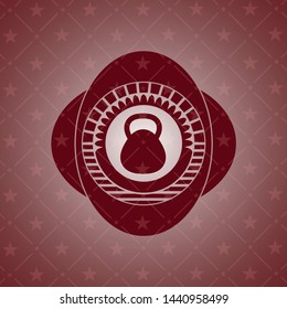  kettlebell icon inside red icon or emblem