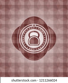 kettlebell icon inside red seamless badge with geometric pattern.