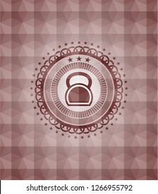 kettlebell icon inside red seamless emblem with geometric pattern.