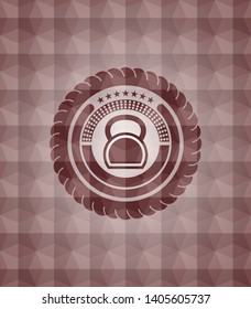kettlebell icon inside red seamless badge with geometric pattern.