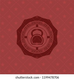 kettlebell icon inside retro red emblem