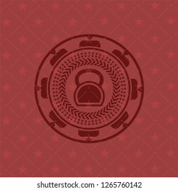 kettlebell icon inside retro red emblem