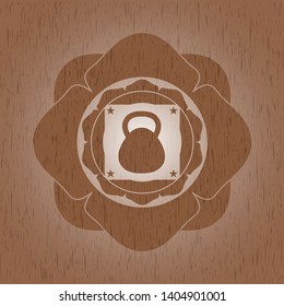 kettlebell icon inside retro wood emblem