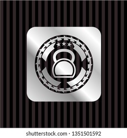 kettlebell icon inside silver badge