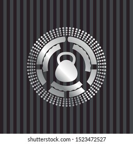 kettlebell icon inside silver badge or emblem