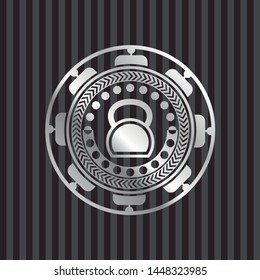 kettlebell icon inside silver emblem or badge