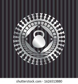 kettlebell icon inside silver emblem or badge