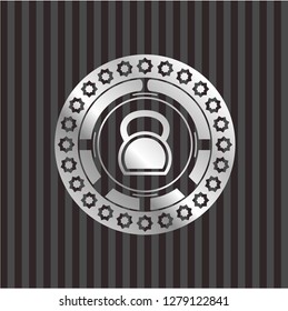 kettlebell icon inside silver shiny emblem