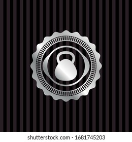 kettlebell icon inside silver shiny badge