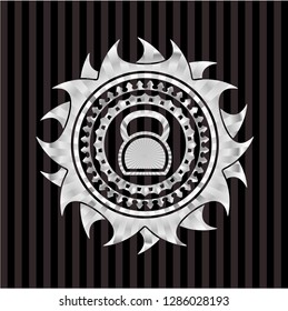 kettlebell icon inside silvery badge or emblem