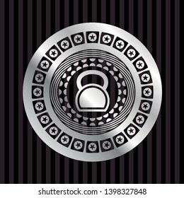 kettlebell icon inside silvery emblem