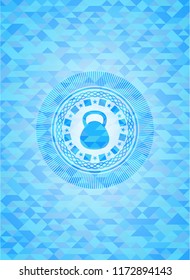 kettlebell icon inside sky blue emblem. Mosaic background