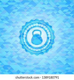 kettlebell icon inside sky blue emblem with triangle mosaic background