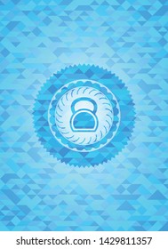 kettlebell icon inside sky blue emblem with mosaic background