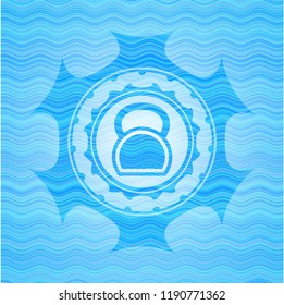 kettlebell icon inside water concept emblem.