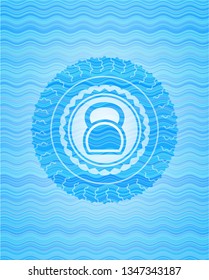 kettlebell icon inside water style emblem.
