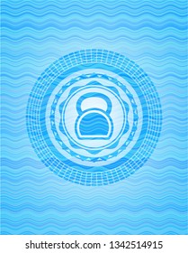 kettlebell icon inside water wave concept emblem background.