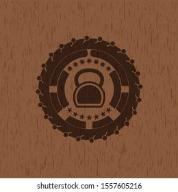 kettlebell icon inside wood emblem. Vintage.