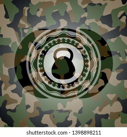 kettlebell icon on camouflaged texture