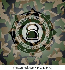 kettlebell icon on camouflaged texture