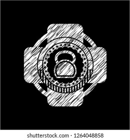 kettlebell icon on chalkboard