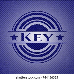 Key badge with denim texture