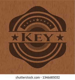 Key badge with wooden background
