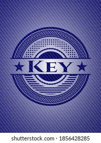 Key emblem with jean texture. Vector Illustration. Detailed. 