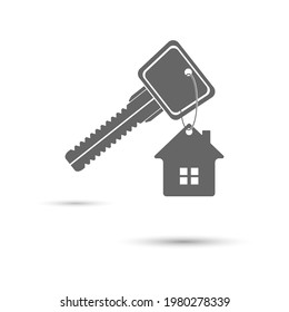 llave de la casa. Una llave con un llavero en forma de casa. Estilo plano.
