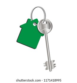 Key house on the ring with a green key fob, rental of property, concept of sale purchase of real estate