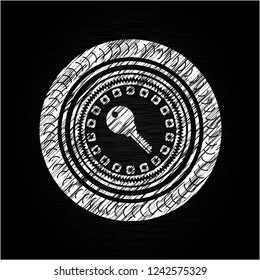 key icon drawn on a blackboard