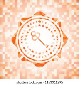 key icon inside abstract emblem, orange mosaic background