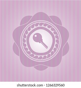 key icon inside badge with pink background