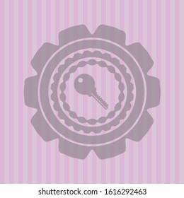 key icon inside badge with pink background