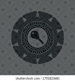 key icon inside black emblem