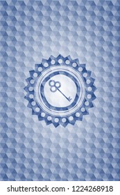 key icon inside blue emblem with geometric pattern background.