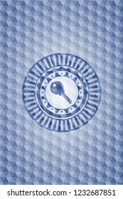 key icon inside blue emblem with geometric background.