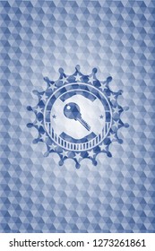 key icon inside blue emblem or badge with geometric pattern background.