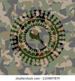 key icon inside camouflage emblem