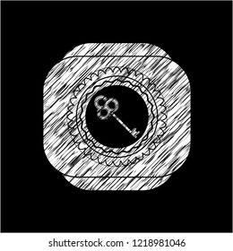 key icon inside chalk emblem