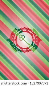 key icon inside christmas badge.