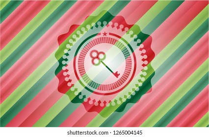 key icon inside christmas colors style emblem.