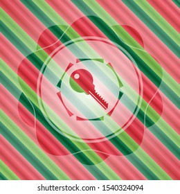 key icon inside christmas colors style emblem.