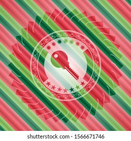 key icon inside christmas colors badge.