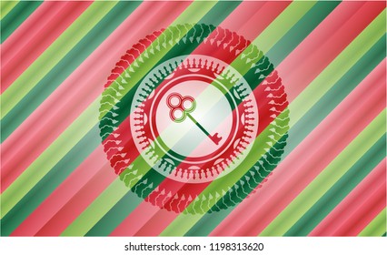 key icon inside christmas emblem.