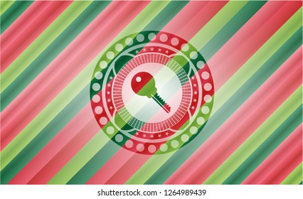 key icon inside christmas emblem background.